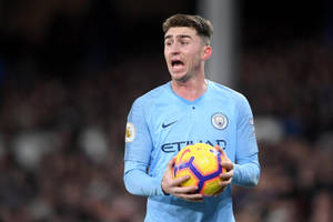 Aymeric Laporte Holding Football Wallpaper