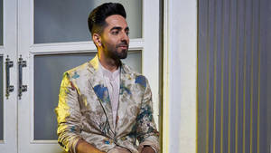 Ayushmann Khurrana In Floral Suit Wallpaper