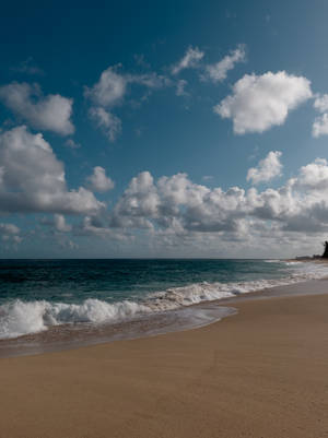 Azure Sky And Beach Waves Wallpaper