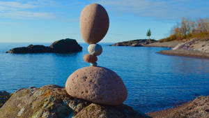 Balanced Stone Art At Lake Superior Wallpaper