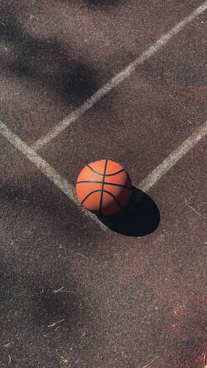 Ball On Concrete Basketball Court Wallpaper