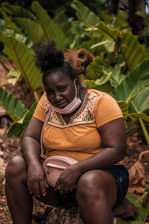 Barbados Squirrel Of Woman Wallpaper