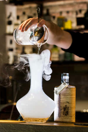 Bartender Pouring Smoky Cocktail Wallpaper