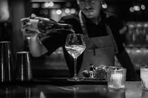 Bartender Pouring Wine Blackand White Wallpaper