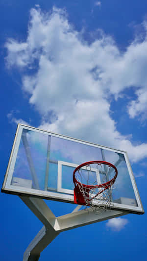 Basketball Hoop Against Blue Sky Wallpaper