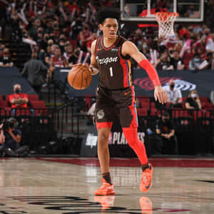 Basketball Player Dribblingon Court Wallpaper