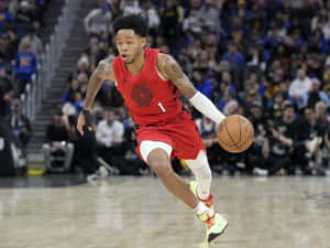 Basketball_ Player_ In_ Action_ Dribbling Wallpaper