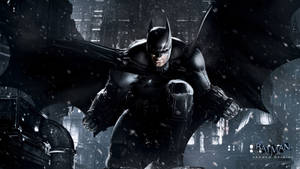 Batman Amidst The Snowfall In Arkham - An Epic 4k Image From Batman Arkham City Wallpaper