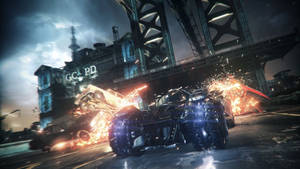 Batmobile In Front Of Crashing Cars Wallpaper