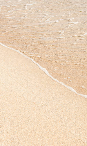 Beach Sand With Beige Background Wallpaper