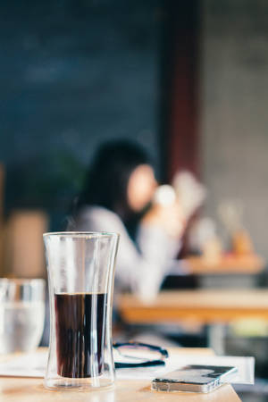 Beaker Glass On Table Wallpaper