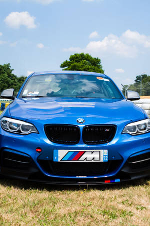 Beautiful Blue Bmw In A Race Track Wallpaper