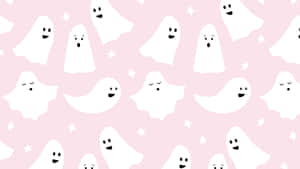 Beautiful Halloween Ghosts On Pink Wallpaper