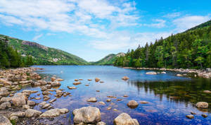 Beautiful Lake With Rocks Wallpaper