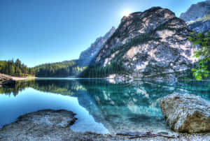 Beautiful Mountain Lake With Reflections On The Water Wallpaper