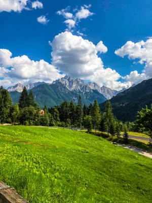 Beautiful Mountain View Painted With Colorful Sky Wallpaper