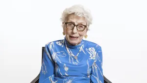 Beautiful Older Woman Blue Atop Wallpaper