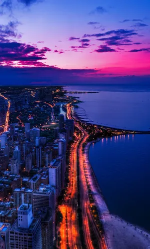 Beautiful Skyline View Of A Bustling City During Sunset Wallpaper