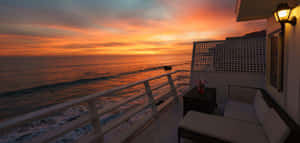 Beautiful Sunrise Over Malibu Beach Wallpaper