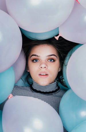 Beautiful Teenage Girl In Balloons Wallpaper