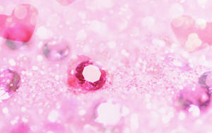 Beauty Unfolds In The Shine Of Sparkling Pink Diamonds And Gems Wallpaper