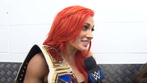 Becky Lynch With Her Championship Belt Wallpaper