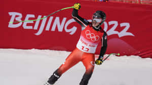 Beijing2022 Skiing Competitor Finish Wallpaper