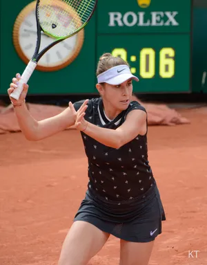 Belinda Bencic Exhibiting Strength In Black Outfit Wallpaper