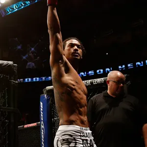 Ben Henderson In Triumphant Pose Post Victory Wallpaper