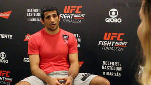 Beneil Dariush Engaged In An Interview Wallpaper