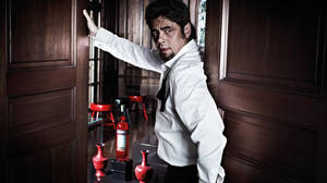 Benicio Del Toro Captivating Stare In The October 2011 Campari Calendar Wallpaper