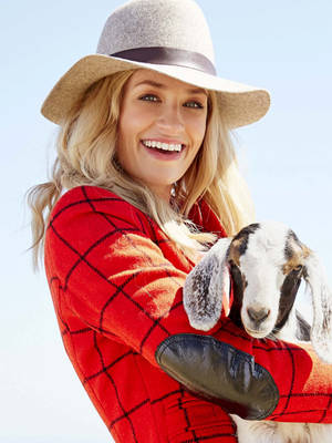 Beth Behrs With Goat Wallpaper