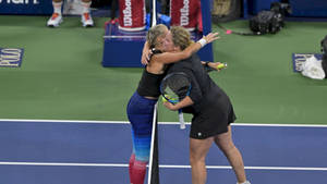 Bethanie Mattek-sands Hugging Kim Clijsters Wallpaper