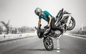 Bike Lover Frontal Wheelie Wallpaper