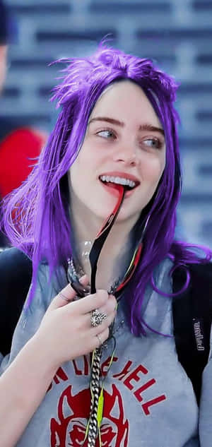 Billie Eilish In A Swathe Of Purple Wallpaper