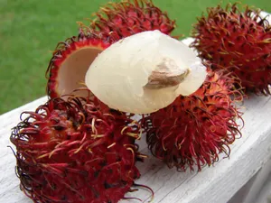 Bite Of Ripe Pulasan Fruits Wallpaper