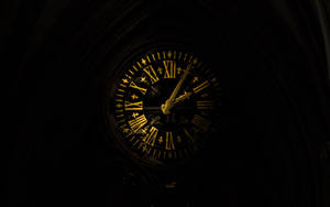 Black And Gold Roman Numeral Clock Wallpaper