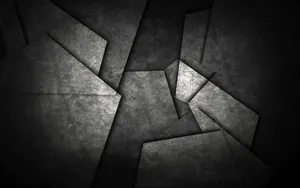 Black And Gray Tiles In A Pile Wallpaper