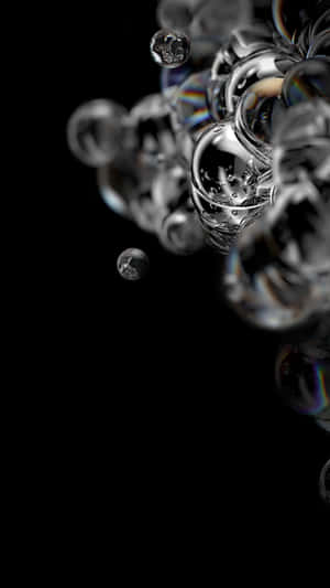 Black And Silver Bubble In Black Mobile Wallpaper