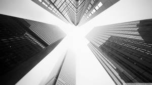 Black And White Aesthetic Towering Buildings Wallpaper