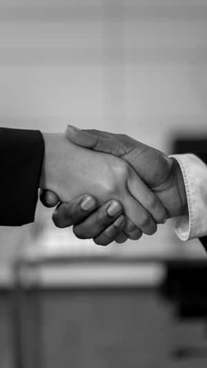 Black And White Firm Handshake Wallpaper