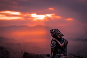 Black Buddha Orange Sky Wallpaper