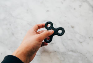 Black Fidget Toy Wallpaper