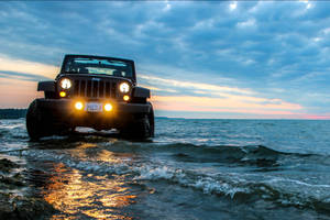 Black Jeep Wrangler On Ocean Wallpaper