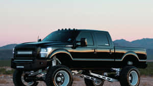 Black Lifted Truck Side View Wallpaper