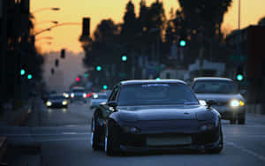 Black Mazda Rx 7 In Highway Road Wallpaper