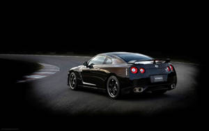 Black Nissan Gtr Car With Vignette Wallpaper