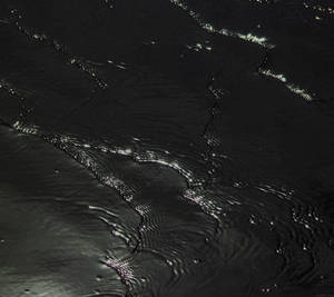 Black Rippling Water Wallpaper