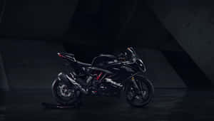 Black Sports Motorcyclein Dark Backdrop Wallpaper