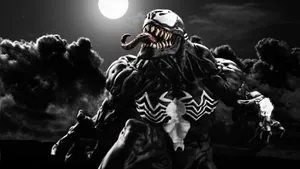 Black Venom Rising Amidst A Fiery Sky Wallpaper